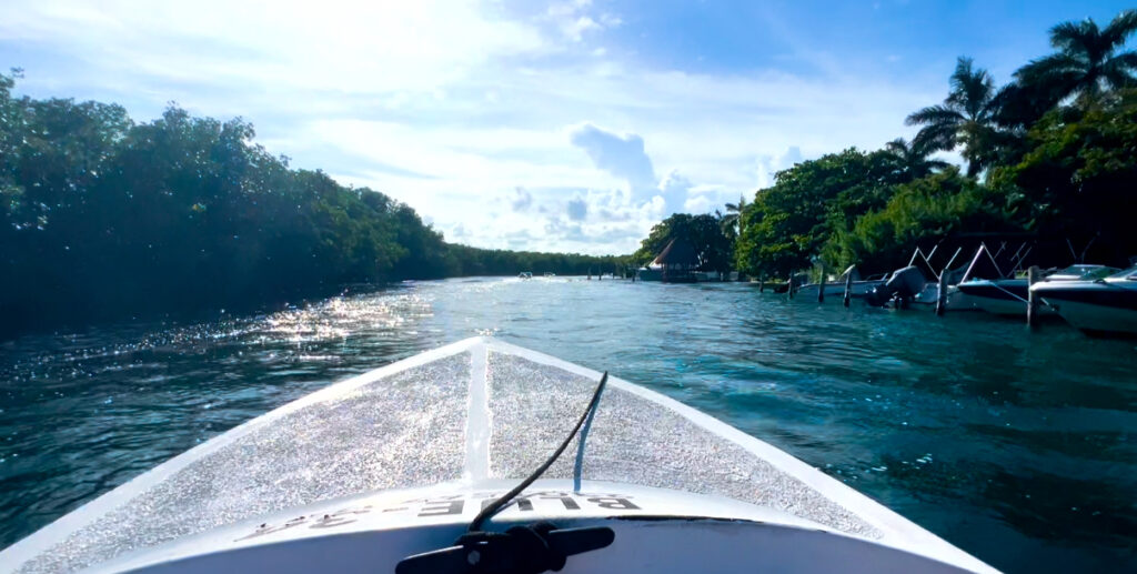 Excursion on a jet boat tour in Cancun, with a boat cruising through turquoise waters, providing a thrilling and scenic adventure